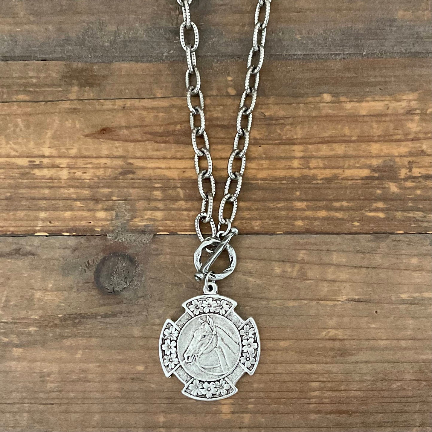 Vintage Silver 18" Chain and Toggle With Reproduction Silver Horse Flower Pendant, side view
