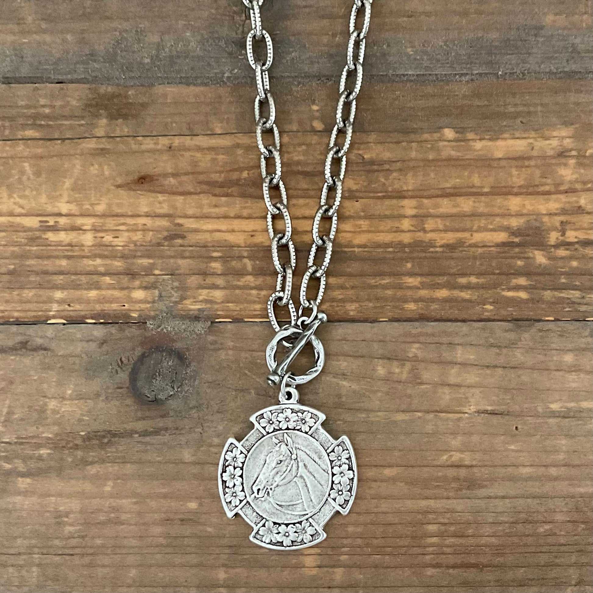 Vintage Silver 18" Chain and Toggle With Reproduction Silver Horse Flower Pendant, side view