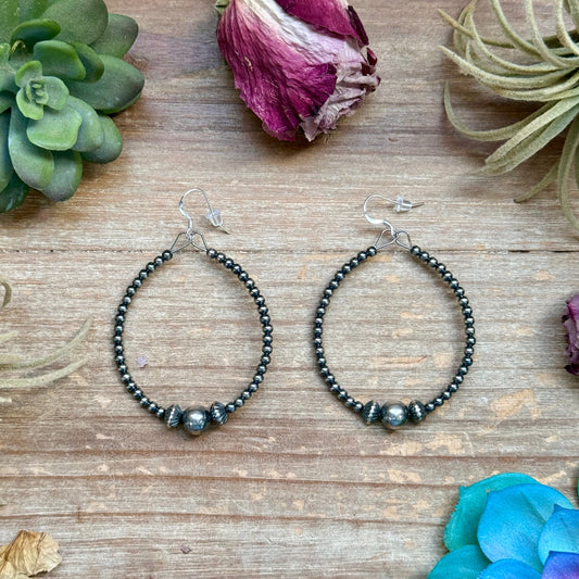 Sterling Silver Pearl Hoop Earrings - 8 mm in the middle, front view